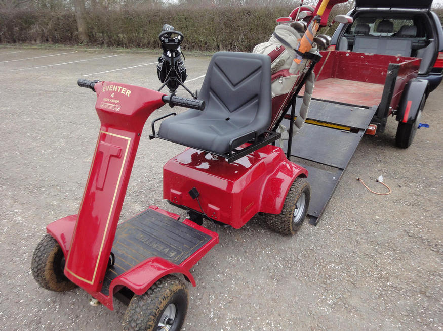 The Patterson Eventer beside a trailer ramp with a golf bag mounted