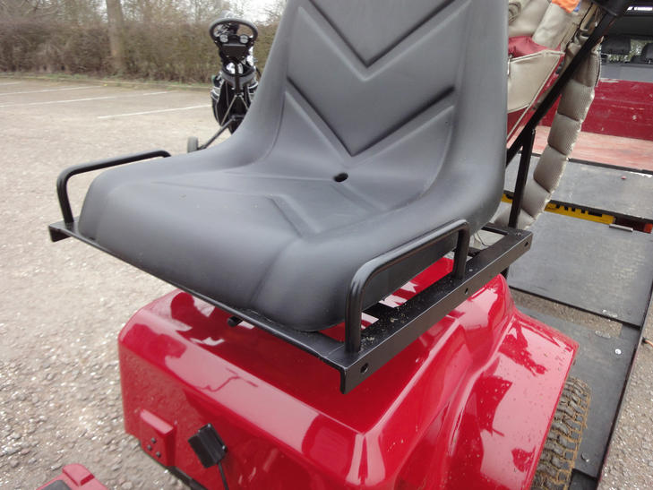Close-up of the Eventer seat with its steel rail and grip loops